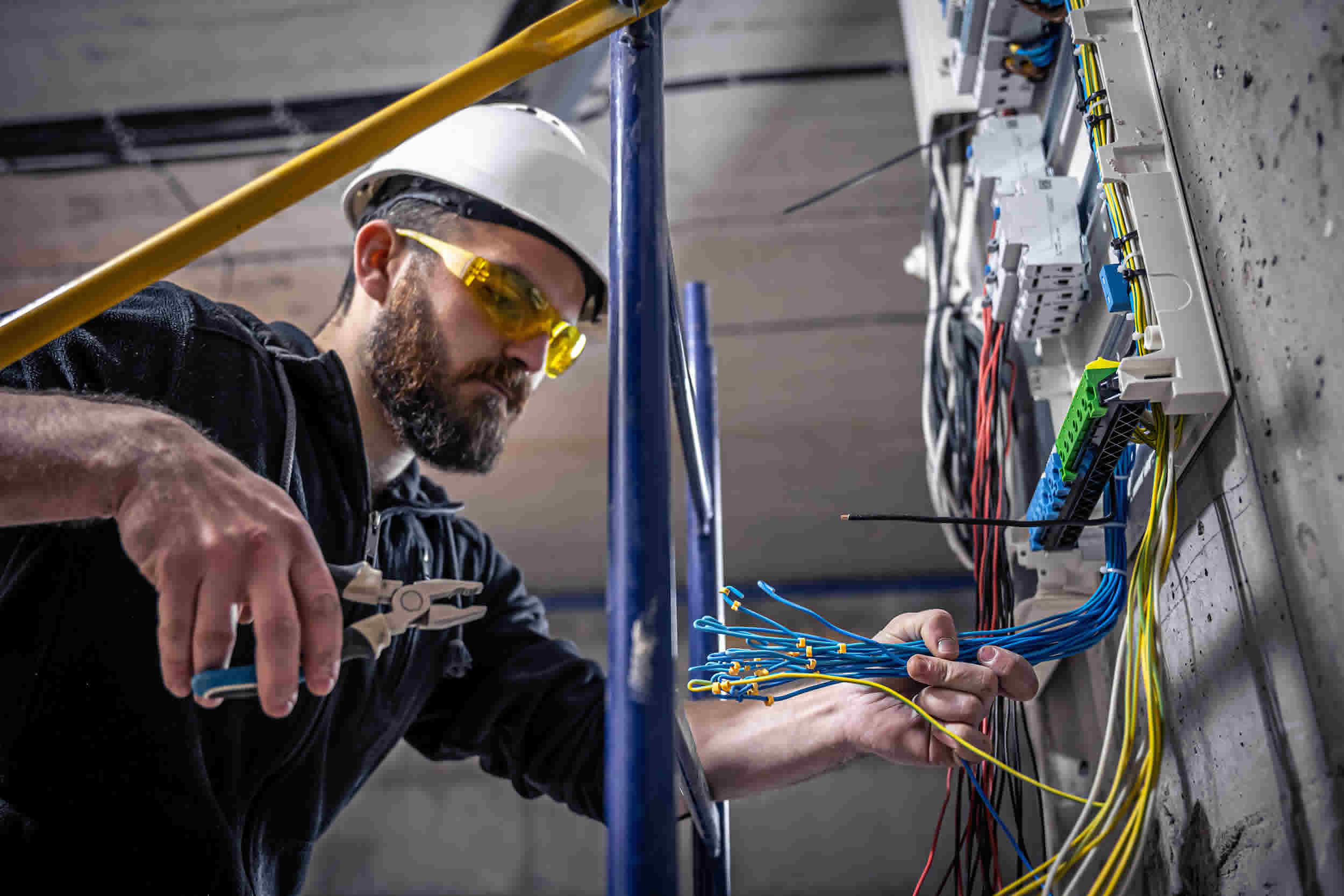 Electrician working with wires